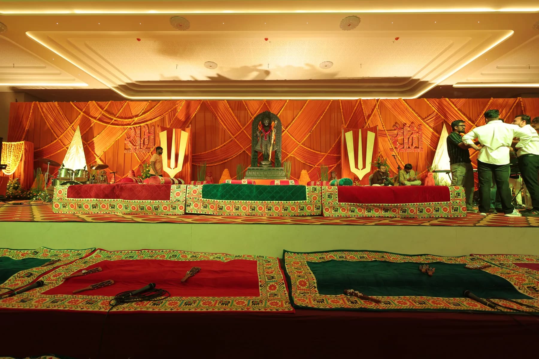 Stage and dining setup inside the banquet hall