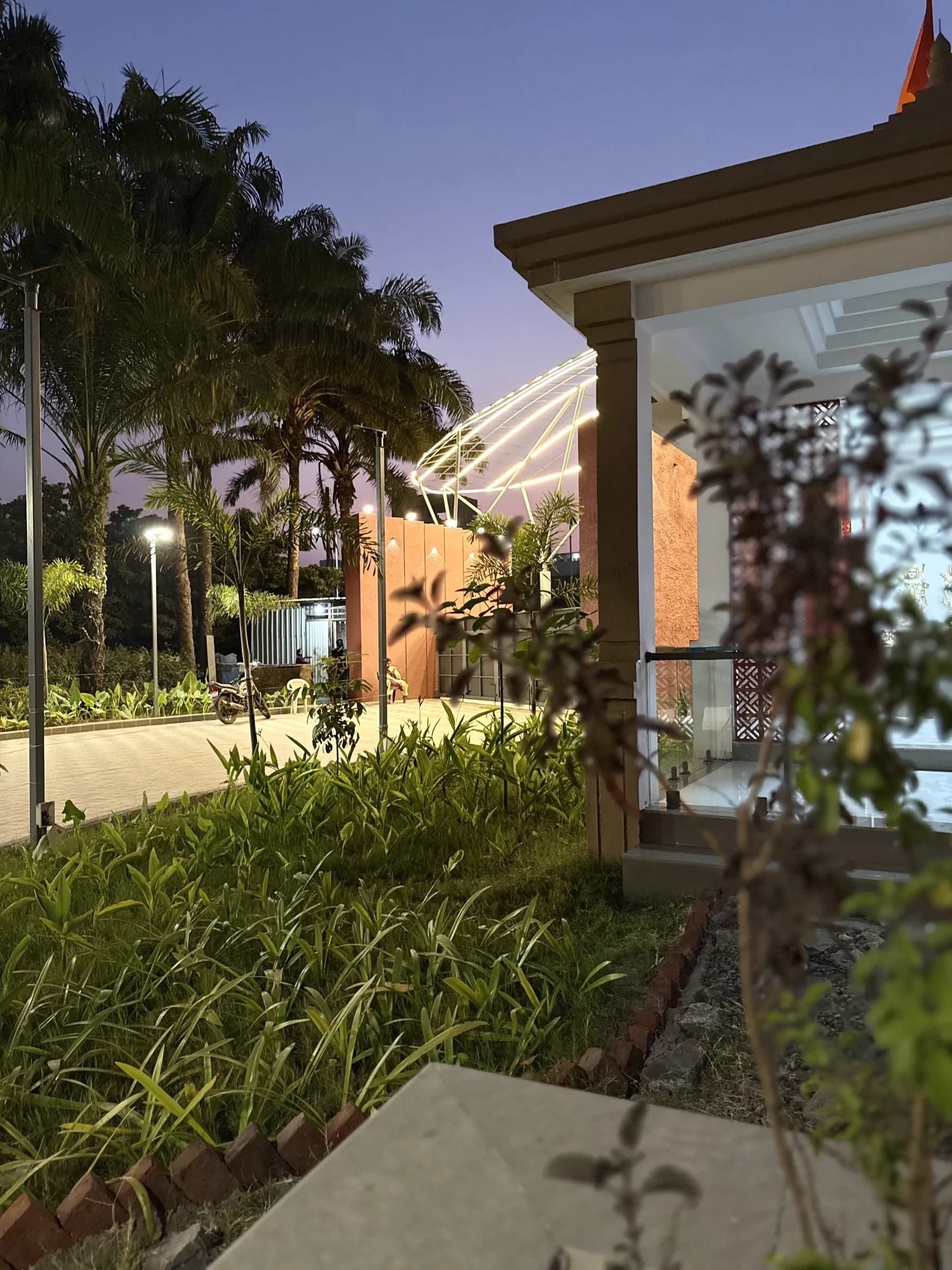 A garden path through the grounds at dusk