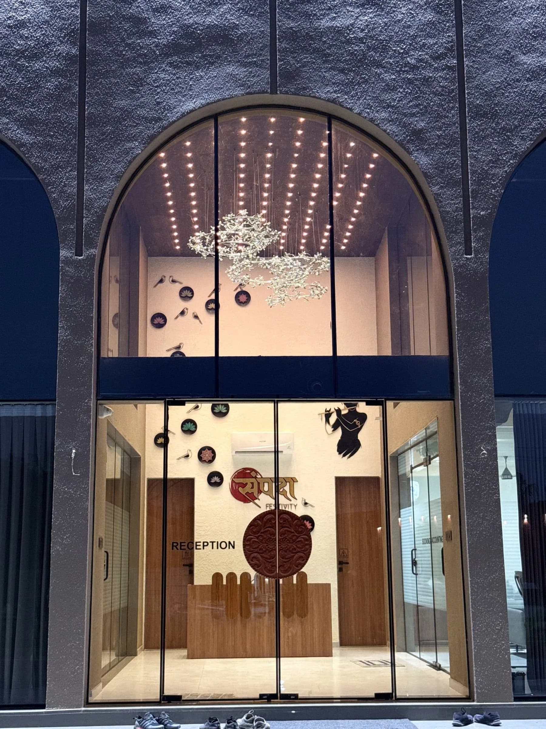 The reception entrance lit at dusk