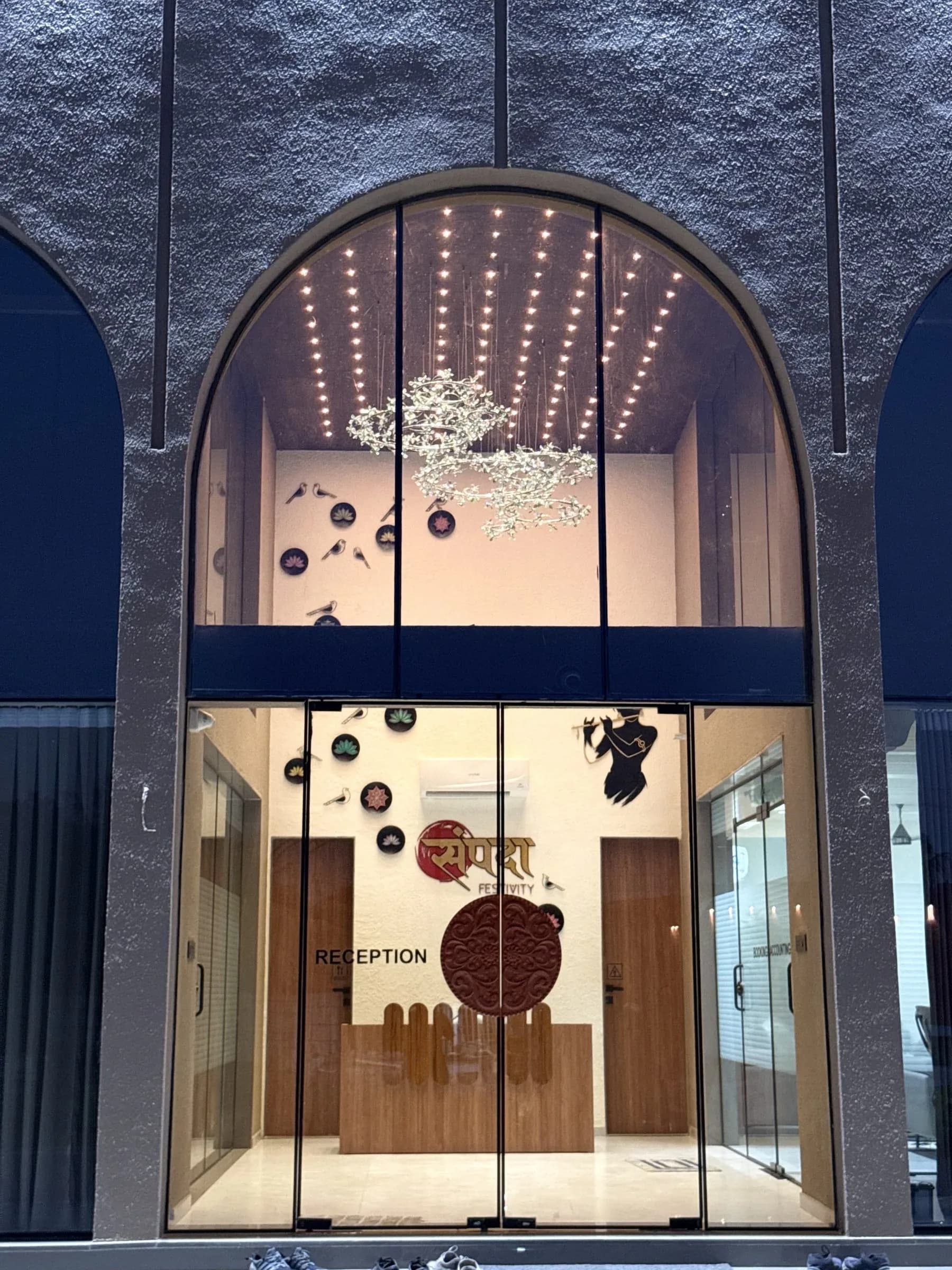 The reception entrance glowing at dusk