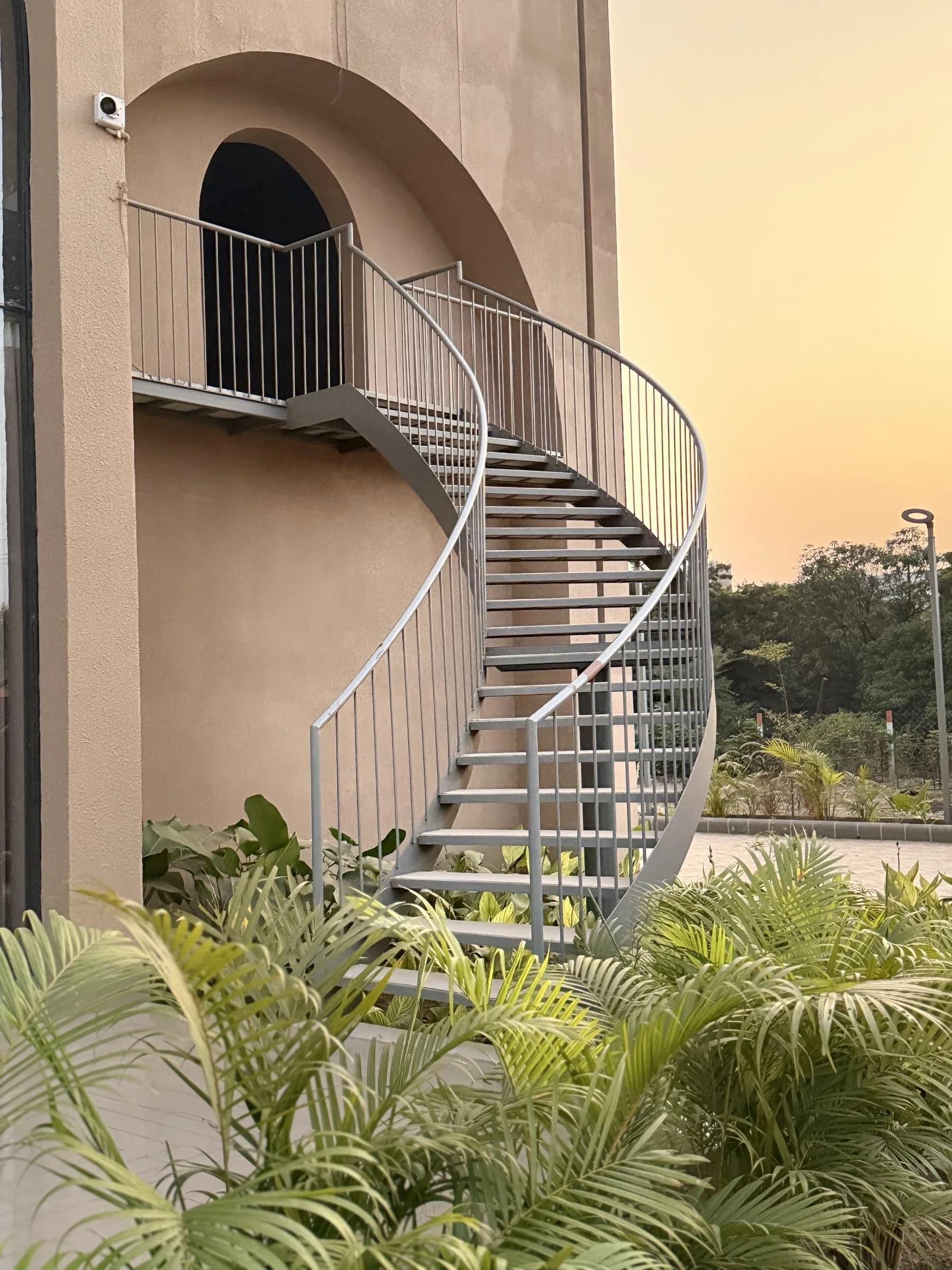 Spiral staircase against the façade