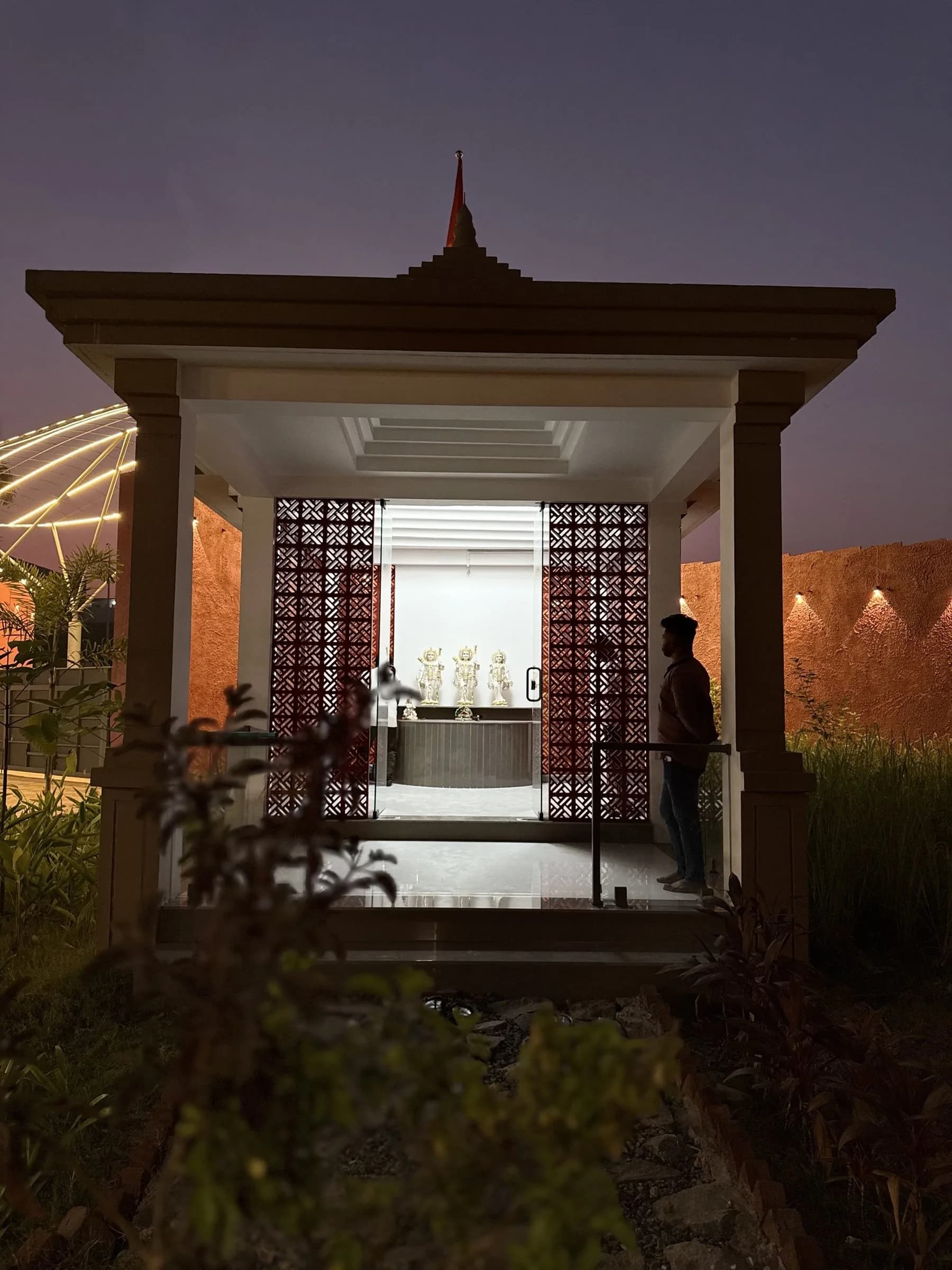 The temple pavilion lit at dusk